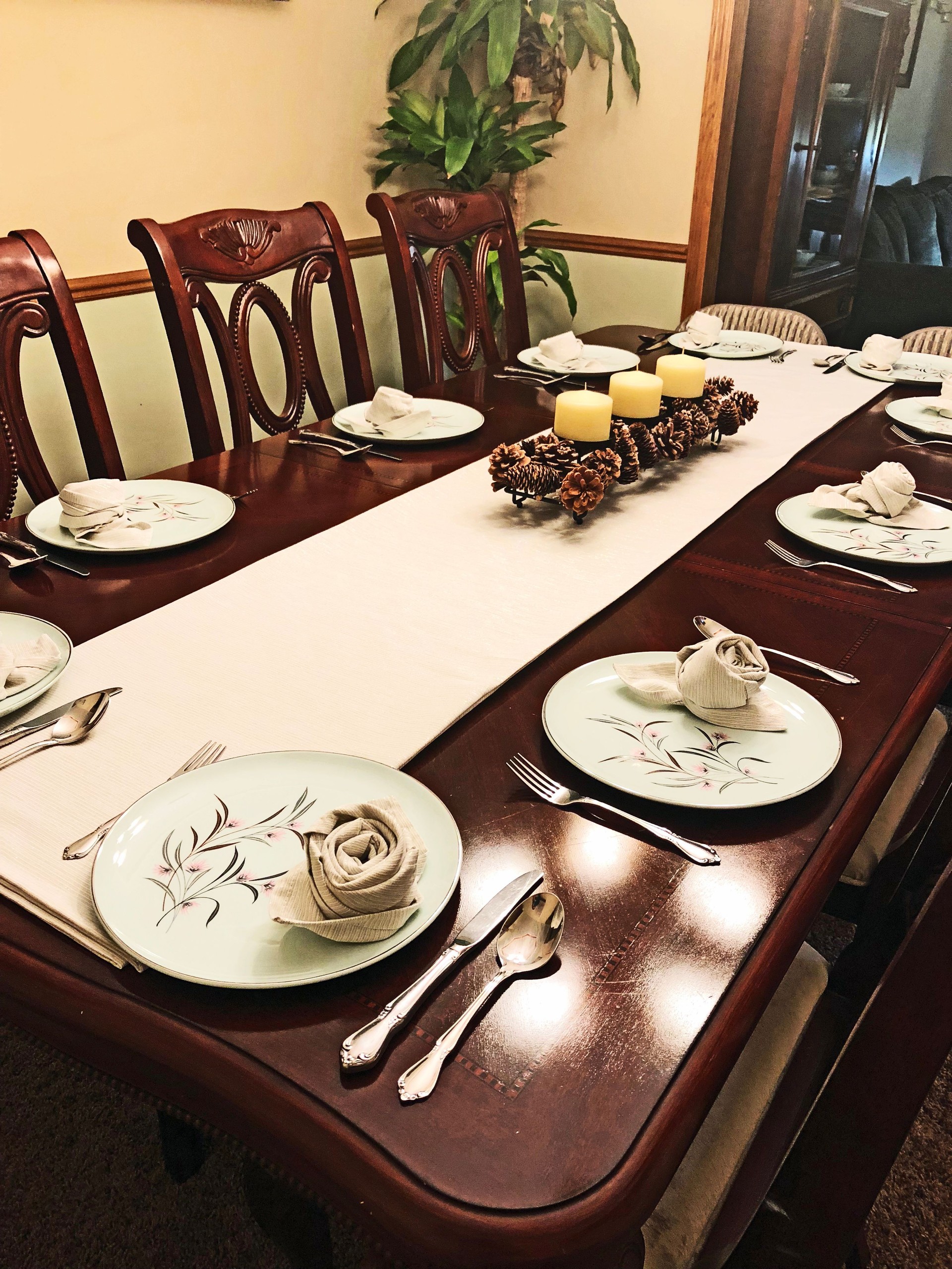 Dining Room Table with Beautiful Antique Place Settings